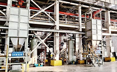 氧化鎢車間噸袋拆包投料使用什么設(shè)備呢？【密閉式噸袋拆包】